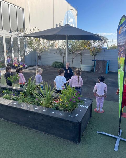 Preschool children learning the rules for a sports game